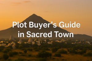 Panoramic view of a serene Tiruvannamalai landscape at sunrise, with Mount Arunachala in the background and the text ‘Plot Buyer’s Guide in Sacred Town’ displayed across the sky in elegant font.